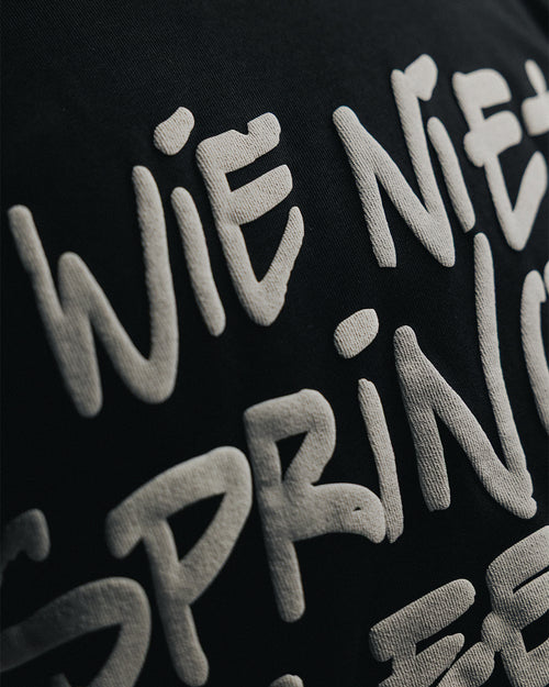 'WIE NIET SPRING IS EEN GERRIT" Tee - STICKS