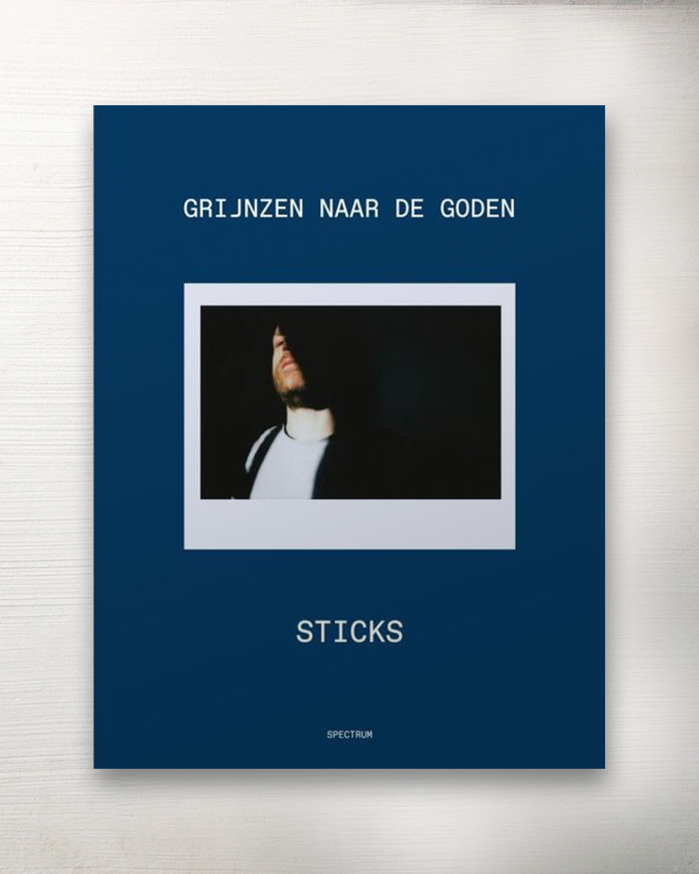 Grijnzen Naar De Goden - Sticks | Hardcover 288 blz.